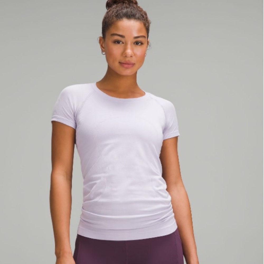 Run swiftly short sleeve/lilac ether /size 10